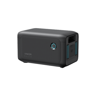The Anker SOLIX BP1000X is a stylish black rectangular portable power station with a textured design and an illuminated circular power button. It includes an expansion battery and a durable LFP battery. One side features multiple ports, such as USB and AC outlets, while the brand name "Anker" is embossed on the side.