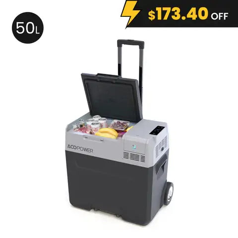 An ACOPOWER black and gray 50L portable cooler with intelligent temperature control sits open, displaying cans, bananas, and snacks. It features a telescopic handle and wheels for easy transport. A banner above highlights a $173.40 discount.