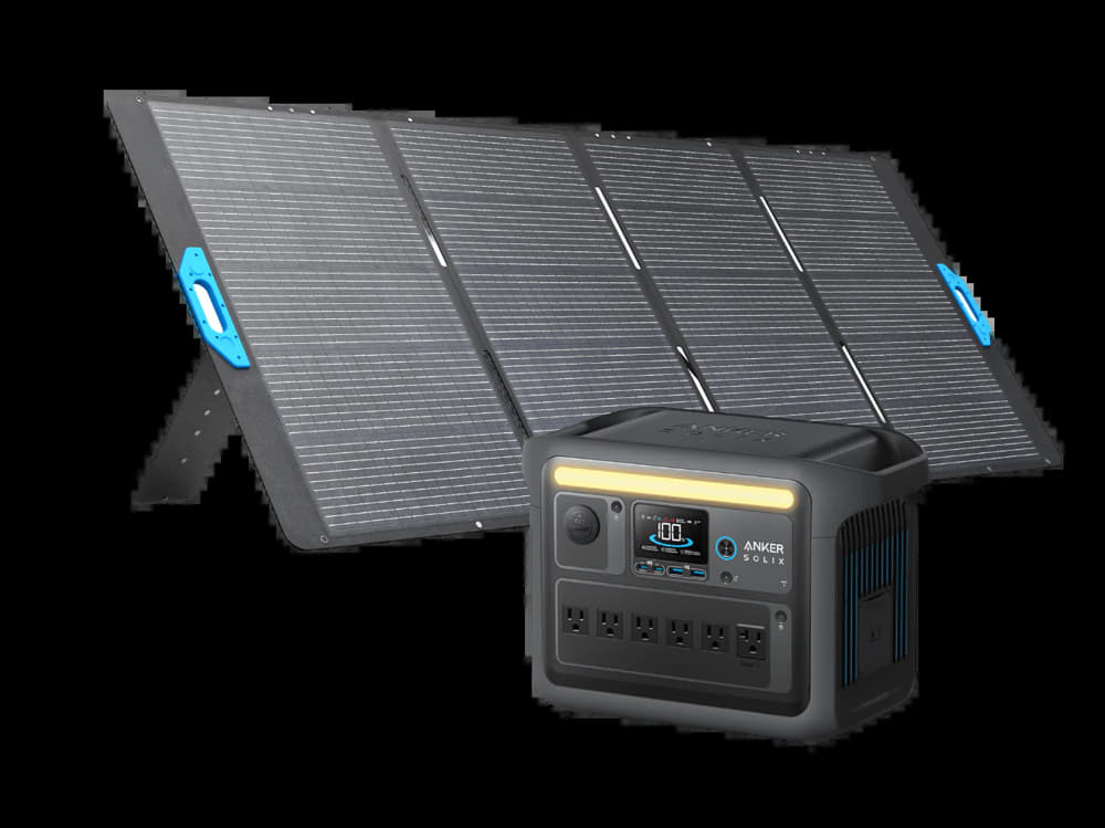 An Anker SOLIX C1000X portable solar panel is displayed alongside a stylish black power station, both ideal for off-grid living. The solar panel boasts a grid texture design with blue handle accents, and the power station features multiple ports along with an LCD screen for convenient access and control.