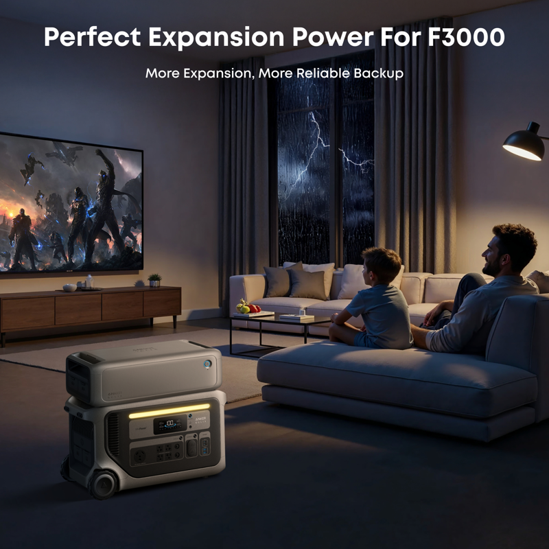 A man and child watch a movie on a large TV in a modern living room during a storm, with the Anker SOLIX BP3000 Expansion Battery (3,072Wh for F3000) beside them, ensuring reliable backup power. Text: "Perfect Expansion Power For F3000.