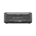 Front view of a Bluetti B300K portable power station from the Apex300 system, showing the brand name, model number, a circular port, LED indicator lights, and the battery capacity labeled as 2764.8Wh on a gray casing.