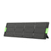 The Nature's Generator portable, foldable solar panel features four connected rectangular segments with a grid pattern, two green carrying handles, and is propped up by a kickstand for high-efficiency solar energy on the go.