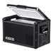 The portable black cooler from ICECO Wholesale, with its lid open to showcase the spacious interior, includes a digital control panel on the side and a sturdy handle. Built with rugged construction and powered by a reliable Secop compressor, it is designed for efficient cooling and preserving items.