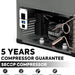 A close-up of an ICECO Wholesale compressor in a transparent casing within a 12V refrigerator highlights its key features. Text reads "5 Years Compressor Guarantee, Secop Compressor." Icons with labels: low noise, energy saving, fast cooling, and 40° anti-shake make it ideal for your dual zone portable fridge needs.