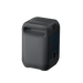 The Anker portable power station is a sleek black rectangle with side ventilation grilles, a top carrying handle, and a clearly visible electrical outlet for easy access.