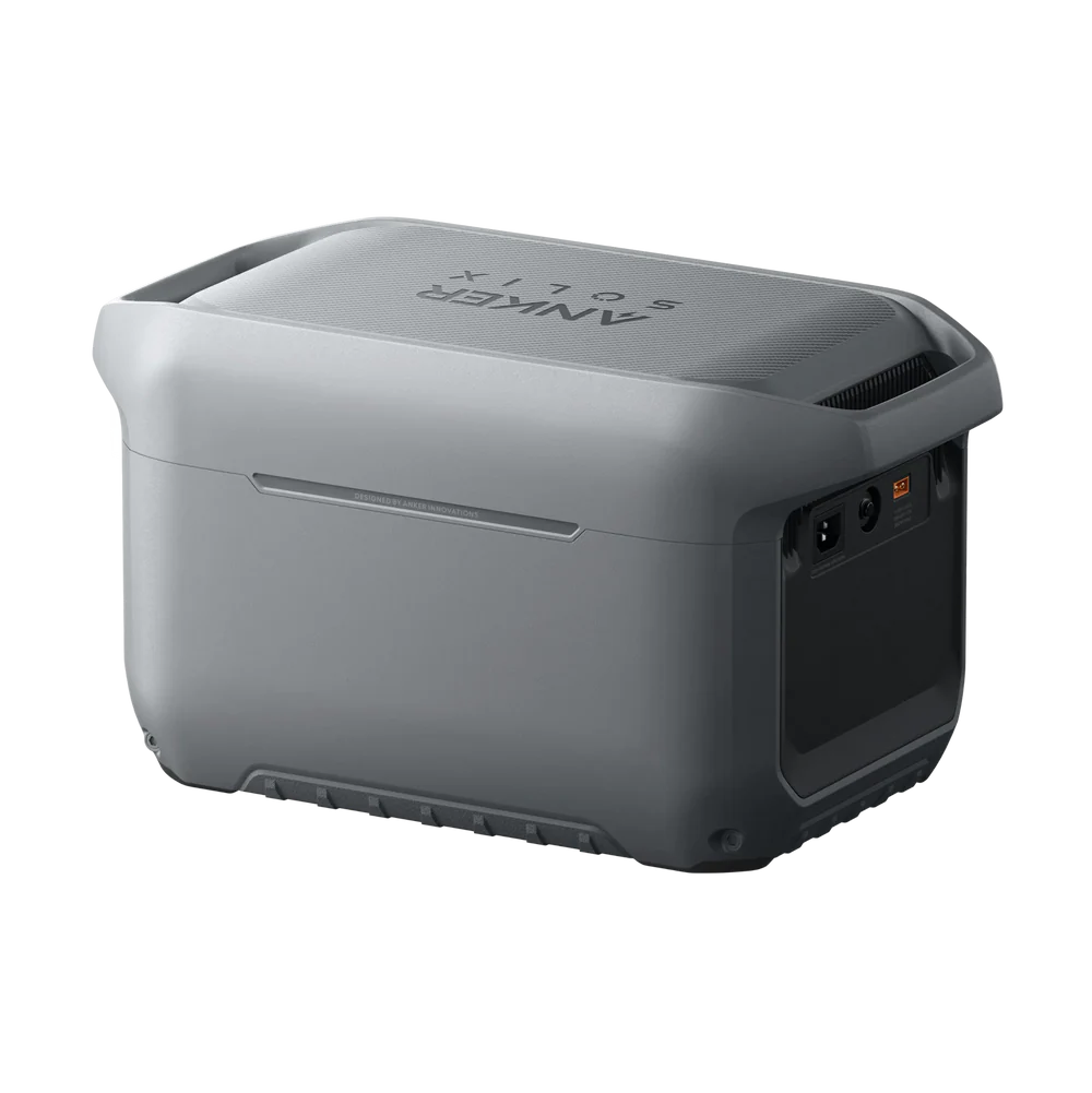 A gray Anker portable power station with a rectangular shape, rounded edges, textured base, and visible ports and controls on one side is shown against a plain white background.