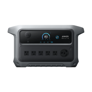 A portable Anker power station features four standard outlets, one round outlet, a display showing 80% battery, and "Anker" labeled at the top right of the front panel.