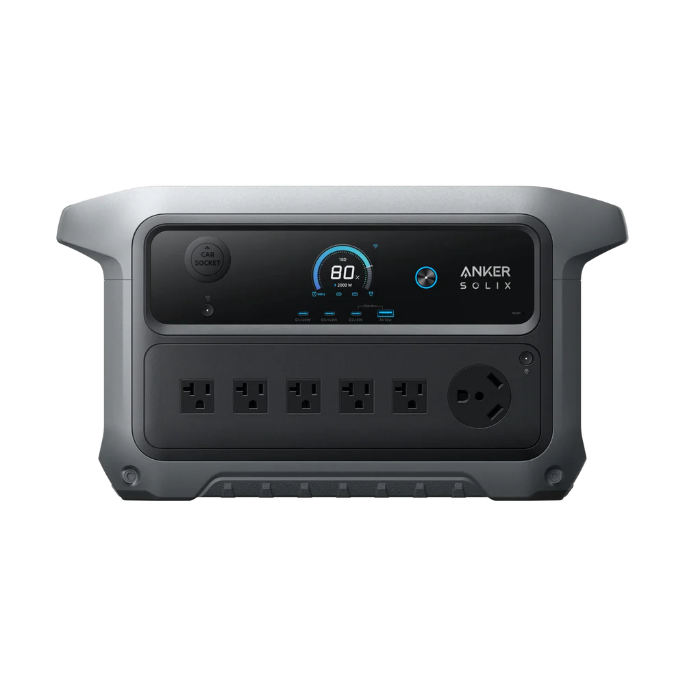 A portable Anker power station features four standard outlets, one round outlet, a display showing 80% battery, and "Anker" labeled at the top right of the front panel.