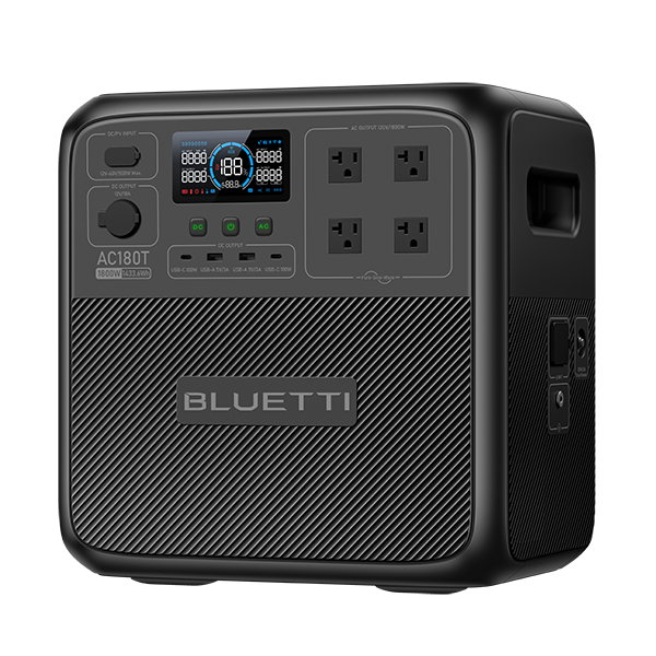 A black rectangular Bluetti portable power station featuring a digital display, several buttons, four AC outlets, various ports, and a side handle. The brand name “Bluetti” is displayed on the front panel.