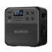 A black rectangular Bluetti portable power station featuring a digital display, several buttons, four AC outlets, various ports, and a side handle. The brand name “Bluetti” is displayed on the front panel.