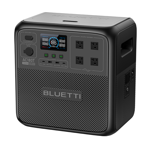 A black Bluetti portable power station featuring four AC outlets, an LCD display, ports on both the front and side panels, and a textured lower section. The Bluetti brand name is embossed on the front panel.