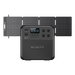 A Bluetti portable power station, featuring multiple outlets and a digital display, is pictured connected to a four-panel solar charger, all set against a white background.
