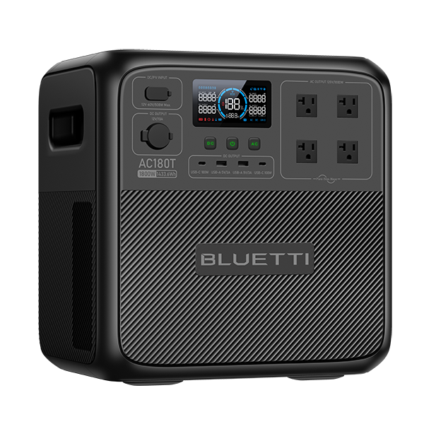 A Bluetti portable power station in black, featuring a digital display, control buttons, four AC outlets, and a textured surface, displayed against a plain white background.