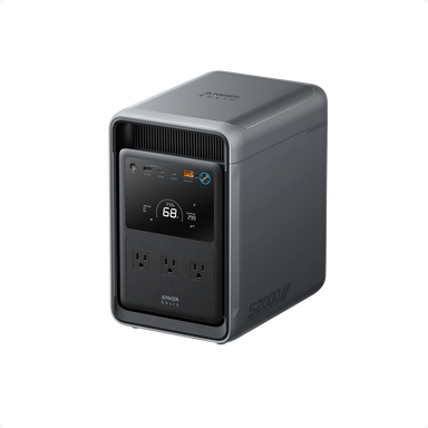 A gray Anker portable power station, model SOLIX S2000, featuring a digital display, three AC outlets, multiple ports, and a top-mounted carrying handle is shown against a plain white background.