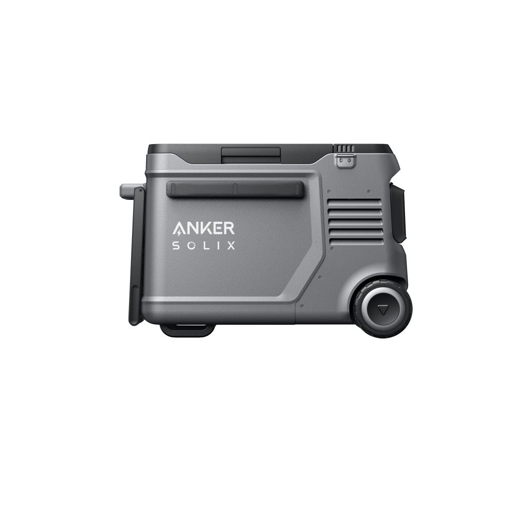 A portable gray Anker solar-charged cooler with wheels, handle, side branding, vent details, and a circular element near the wheel. Designed for easy mobility. Set against a plain white background.