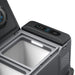 Anker portable electric cooler with open lid reveals an empty interior, built-in light, and digital control panel on the top edge showing temperature settings.