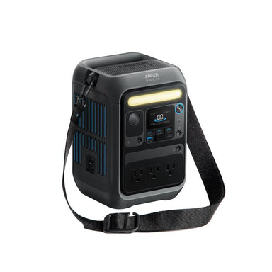 The Anker SOLIX portable power station features a carrying strap, LED display, three AC outlets, power button, blue accent lines, and a built-in LED light on the front panel.