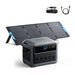 Anker's portable power station with outlets, ports, and a digital display at 80% is shown next to an unfolded Anker solar panel. Two cables are visible above the devices.