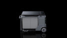 An Anker gray, box-shaped electric cooler with wheels and a digital display on the top right corner, shown against a black background.