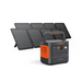 A Jackery Explorer 2000 v2 portable power station by Jackery, featuring a distinctive orange and black design, is displayed in front of six upright foldable solar panels arranged in a row. The power station is equipped with advanced LiFePO4 battery technology and includes multiple input and output ports.