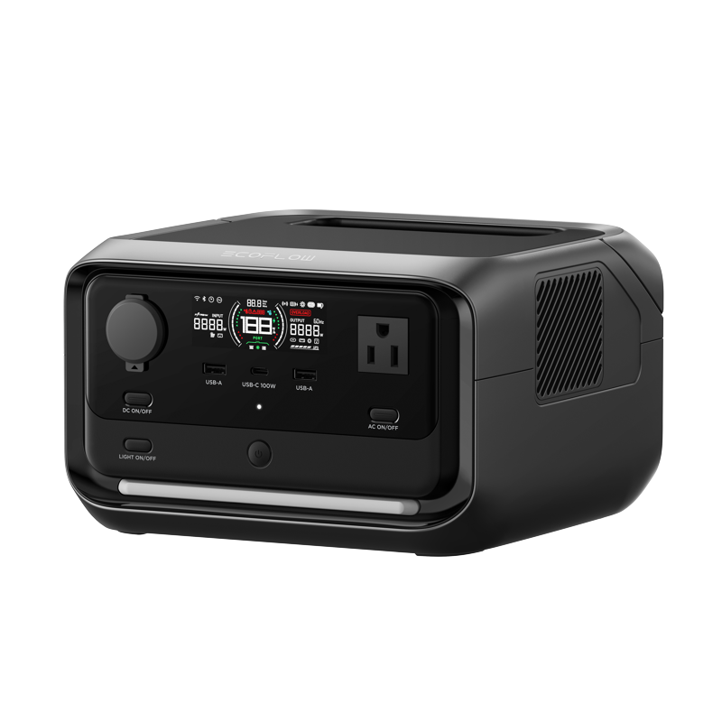 The EcoFlow portable power station features a digital display for battery percentage, multiple ports including USB-A, USB-C, and AC outlets. It has a black design with side ventilation and EcoFlow branding on top.