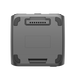 The image displays the underside of a compact, rectangular EcoFlow electronic device with rounded edges. It appears to be a battery or charging dock, featuring central connector pins and small rubber pads at each corner.