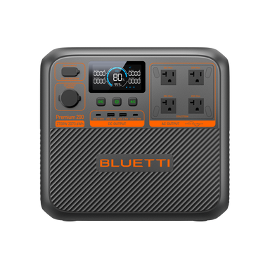 A Bluetti portable power station featuring four AC outlets, a digital display, and multiple input/output ports on the front panel. The device sports a gray and black design with orange accents and branding.