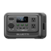 Front view of a Bluetti portable power station featuring input/output ports, AC outlets, a digital display screen reading 100%, control buttons, and the Bluetti brand name at the bottom.
