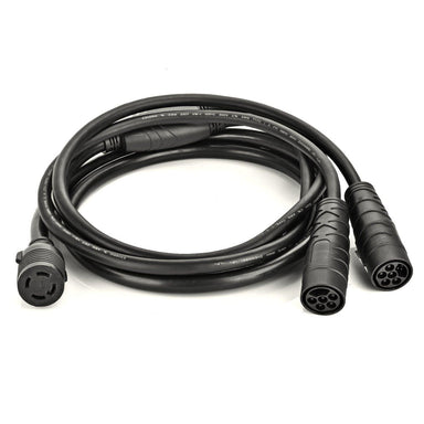 A black Nature's Generator Combiner Cable, featuring a three-prong female connector and two multi-pin round connectors, is coiled neatly on a white background and supports up to 7200W power capacity.