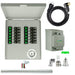 A gray Nature's Generator transfer panel with green-labeled breakers, assorted cables, power inlet box, black cord, metal conduit, and electrical connectors—perfect for use with a generator and transfer switch—shown on a white background.