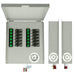 A Nature's Generator metal control panel with open lid displays labeled switches and indicator lights, flanked by two rectangular side units featuring wiring, a circular connector port, and compatibility with a 12-circuit 50 amp transfer switch.