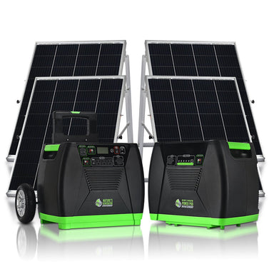 Two Nature's Generator portable solar generators with control panels are set in front of four standing solar panels—ideal for off-grid power or home backup. The black units have green accents; one features wheels and a handle for easy transport.