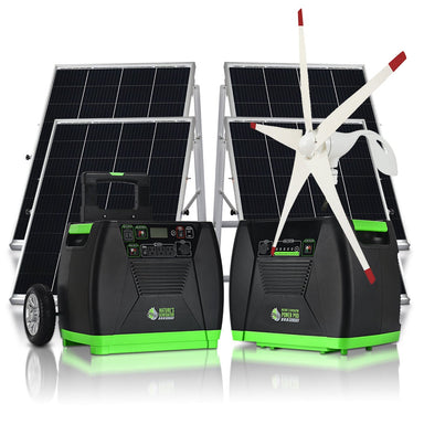 Two black and green Nature's Generator portable solar generators sit before two solar panels and a compact white wind turbine with red tips, all on a white background. The units show ports and controls for home backup or off-grid use.