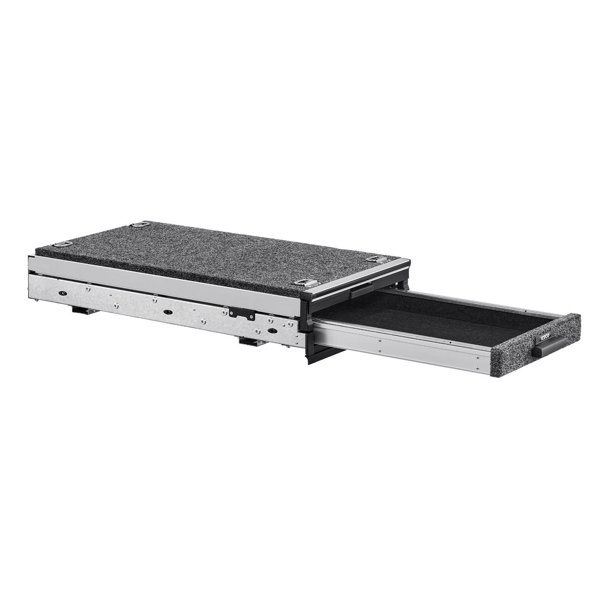 The ICECO Wholesale DS15 Roller Drawer System is shown partially open, featuring a carpeted metal surface. This roll-out drawer with a small handle on the front panel provides efficient storage for utility or vehicle systems.