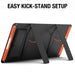 Jackery black and orange portable solar panel with two extended kickstands, shown from the back at an angle. Arrows highlight kickstand setup direction. Text above reads: "EASY KICK-STAND SETUP.