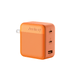 The orange Jackery charger features a foldable plug, two USB-C ports, one USB-A port, and a textured rectangular design. This compact GaN device delivers 100W fast charging for your devices on the go.