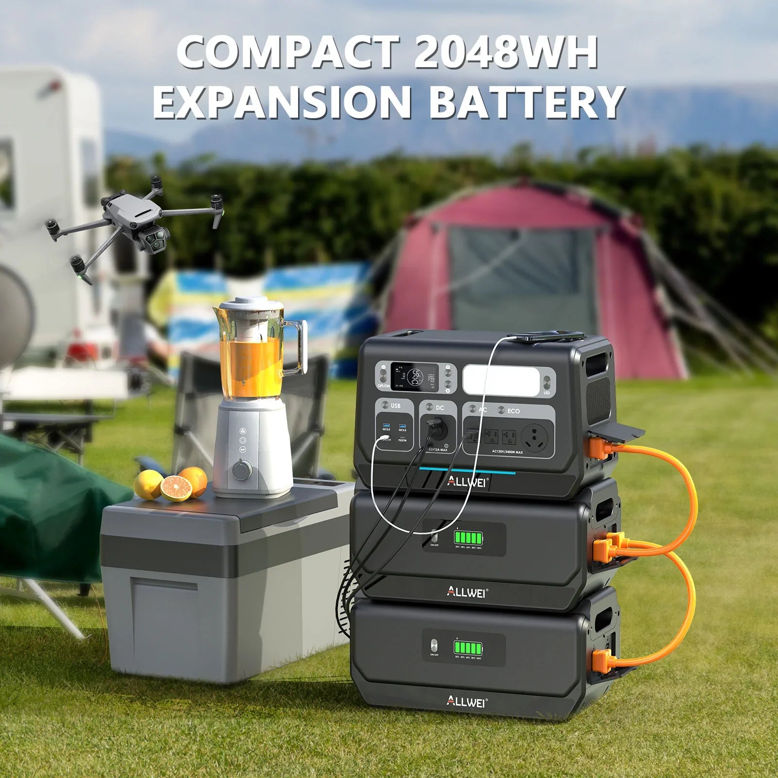 ALLWEI US compact 2048Wh expansion battery powers a blender and a drone outdoors by a tent, RV, and cooler at a campsite.