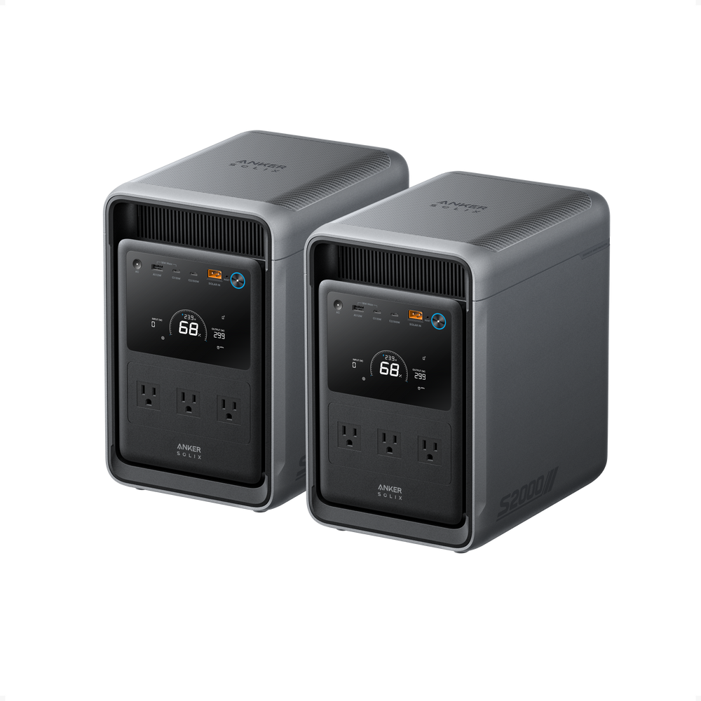 Two Anker SOLIX S2000 portable power stations side by side, included in the S2000 x2 dual-unit bundle