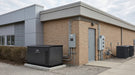 Briggs & Stratton 30kW Fortress commercial standby generator installed at a commercial building's service area