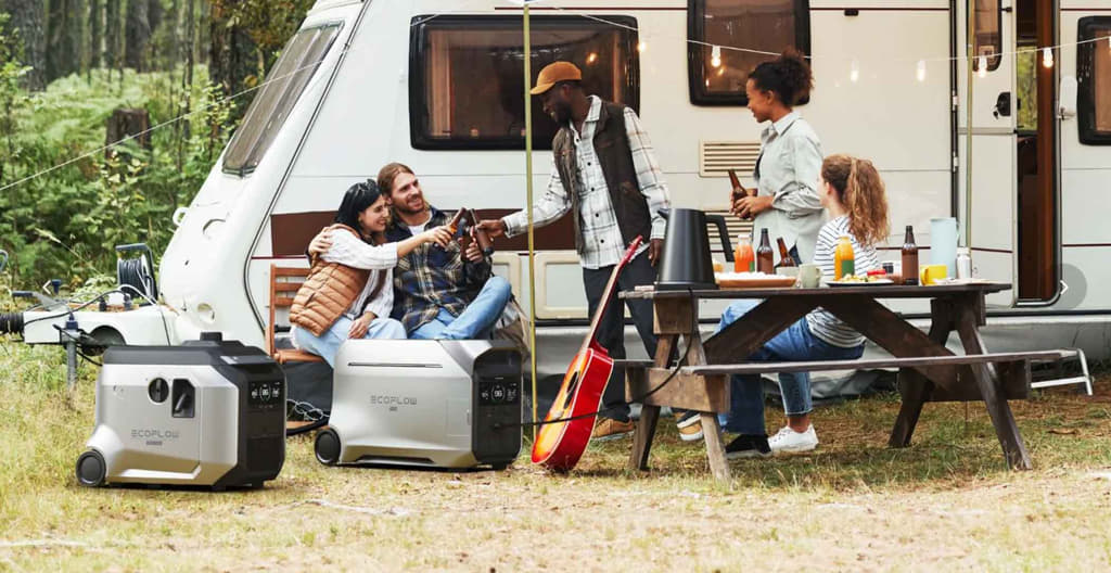 Group of people camping with EcoFlow Dual Fuel Smart Generator 4000 next to an RV