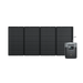 An EcoFlow DELTA 2 Max portable power station with a display screen is connected to four black EcoFlow 400W portable solar panels, arranged side by side against a white background.