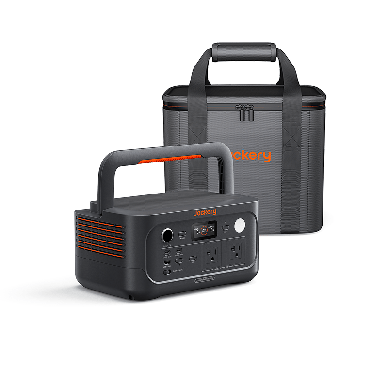 A Jackery portable power station with multiple ports and a handle is displayed in front of its matching gray carrying case with orange accents and the Jackery logo, both set against a plain white background.