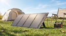 Jackery SolarSaga 40 Air solar panel charging a Jackery power station at a sunny campsite