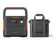 A portable Jackery generator with multiple sockets and a digital display is placed beside a black Jackery carrying case with orange accents, handles, and straps, all set on a white background.