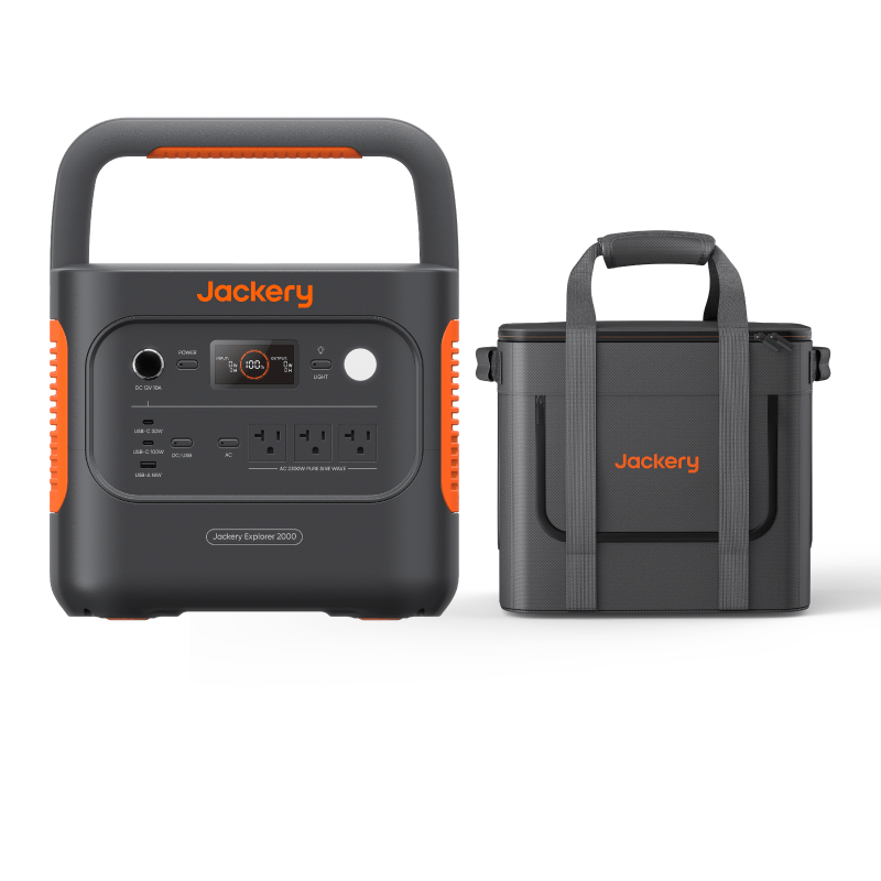 A portable Jackery generator with multiple sockets and a digital display is placed beside a black Jackery carrying case with orange accents, handles, and straps, all set on a white background.