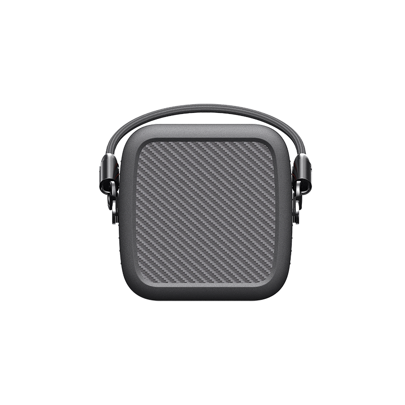 A compact, rectangular black hard-shell carrying case by Jackery with a textured grid-like front panel and a short handle attached to both sides, shown against a plain white background.