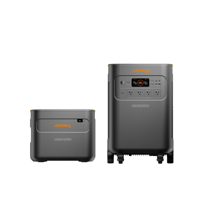 Two gray Jackery portable power stations are displayed on a white background. The larger Jackery Explorer 5000 Plus solar generator features multiple outlets, a display, and wheels, while the smaller unit has a simpler panel with lid and branding.