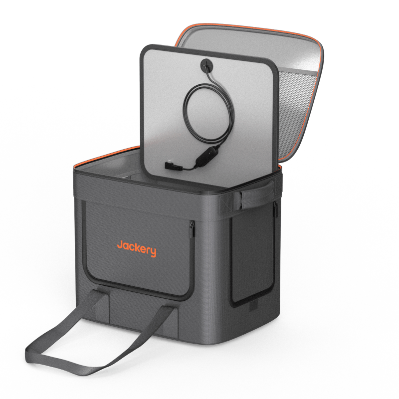 A gray Jackery portable cooler with an open lid shows a power cord inside. It features waterproof, dustproof protection, carrying straps, exterior pockets, and orange accents on the lid and logo.