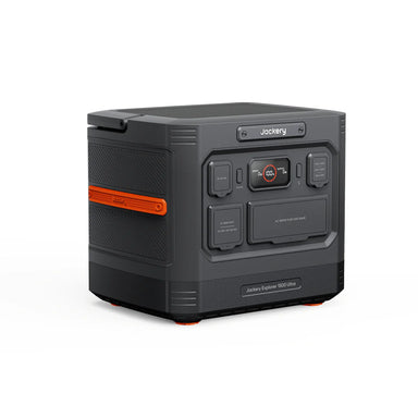 The Jackery Explorer 1500 Pro is a black and orange solar generator with power outlets and a display panel on the front, a textured side handle, stable base, and offers 1500Wh capacity for dependable portable power.