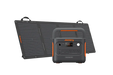 A Jackery portable power station with an orange and black design is displayed in front of a foldable solar panel on a white background. The backup station features multiple ports, a convenient top handle, and is made by Jackery.